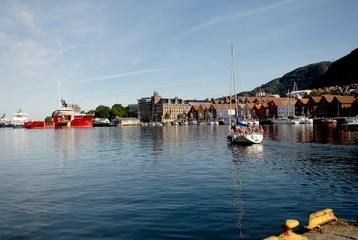 Yacht at Vagen bay, Bergen, Norway. Bryggen street in Bergen - architecture background