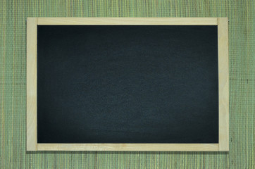 Blackboard on the natural hemp mat