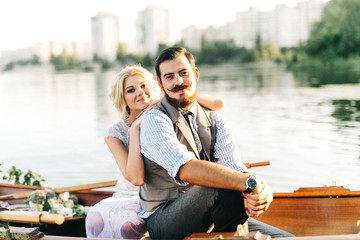 Fototapeta na wymiar Wedding couple in the boat
