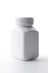 White plastic medicine bottle on white background;