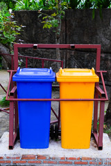 Fototapeta na wymiar trash bin recycle yellow red blue background texture