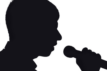 Silhouette of a young pop singer