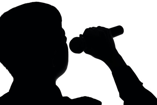 Silhouette of a musical artist with microphone