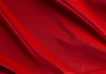 Fototapeta na wymiar Red velvet with pleats, top view