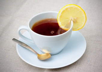 Tea with  lemon on  table