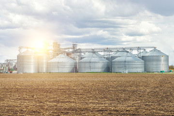 Agricultural Silos against the sky .