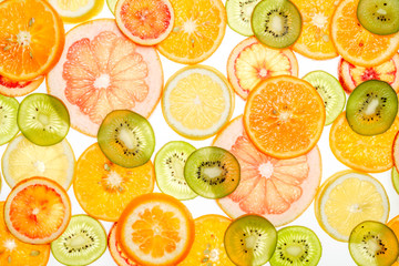 Mixed transparent citrus fruit on white