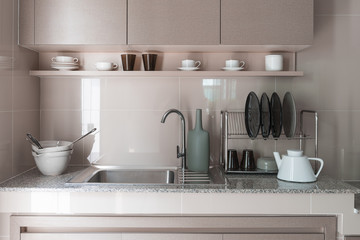 stainless steel sink with faucet on kitchen counter