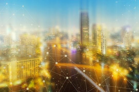 Network connection technology with modern cityscape background. Network connection concept. E-commerce, easy community life in modern city.