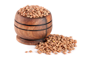 Fototapeta na wymiar Lentils in a wooden bowl isolated on a white background