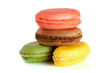 four macaroons isolated on white background closeup