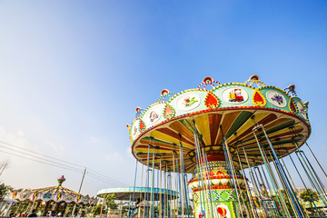 Carousel. Horses on a carnival Merry Go Round.