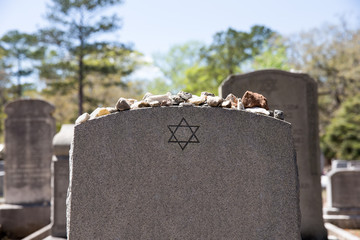 Headstone in Jewish Cemetery with Star of David and Memory Stones - 145749334