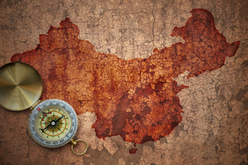 Fototapeta na wymiar map of china on a old vintage crack paper
