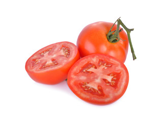 whole and half cut fresh tomato on white background