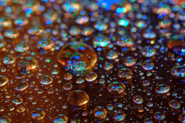 Rain drop on the mirror with light bokeh background
