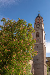 Fototapeta na wymiar the bell tower of the Cathedral of St. - Nicholas in Merano, Bolzano, south Tyrol, Italy