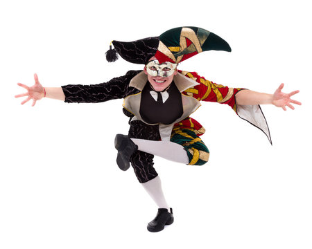 harlequin wearing a mask, isolated on white background in full length.