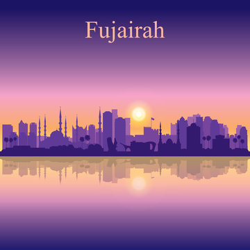 Fujairah silhouette on sunset background