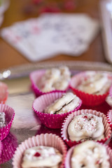 White chocolate covered pretzels on a silver platter