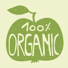 100% organic on a green apple. - obrazy, fototapety, plakaty