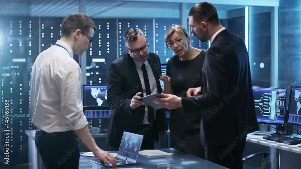Aufkleber team of government officials have constructive discussion in monitoring room. man holds tablet, lapt