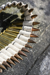 Bullets in ammunition belts outdoor for machine gun.