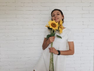 happy girl and sunflowers