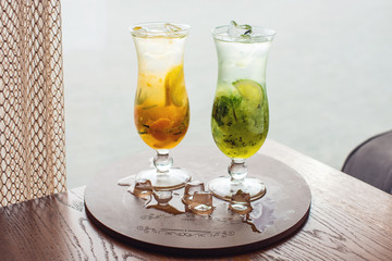 Fruit lemonade with kiwi and lime, orange, tangerine.