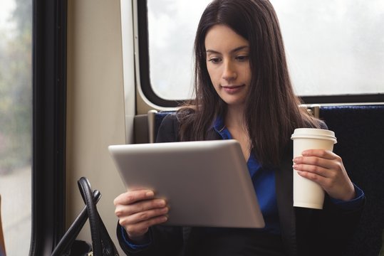 Woman using tablet computer