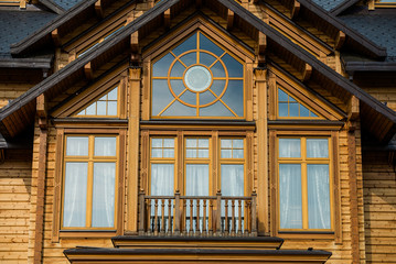 Fototapeta na wymiar large window in a wooden house
