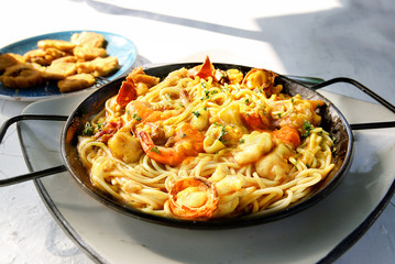 Seafood pasta. Spaghetti with Clams, Prawns, Seafood Cocktail. Dominican Republic