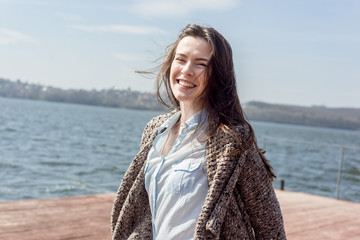 Summer portrait of happy young beautiful woman with a smile