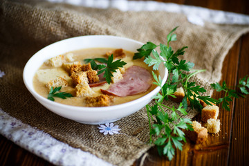 Vegetable soup puree with cheese, bacon