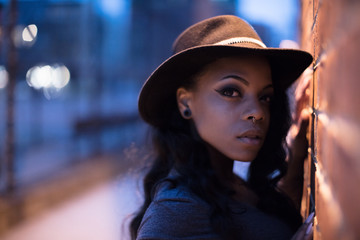 A portrait of a young, fashionable, african american woman in the streets of Brooklyn, New York City. Shot during the spring of 2017.