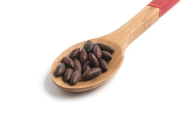 Brazilian Castanha de Baru Nut into a spoon