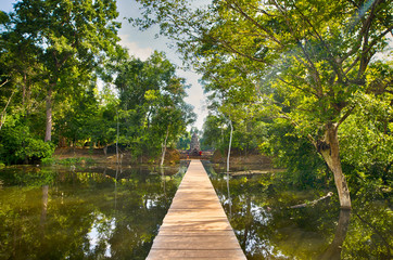 Fototapeta na wymiar The path towards to Neak Pean temple on artificial island. Siem Reap, Cambodia