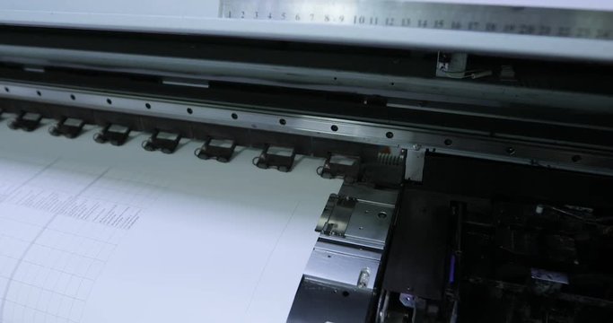 Machine working in printing house