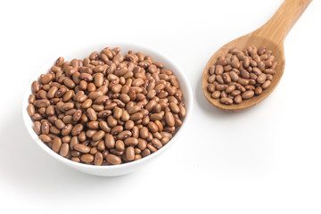 Brown Mulatinho Beans into a bowl
