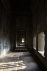 Fototapeta na wymiar Typical window balusters with a beautiful sun shadow found at Angkor Wat, Siem Riep, Cambodia