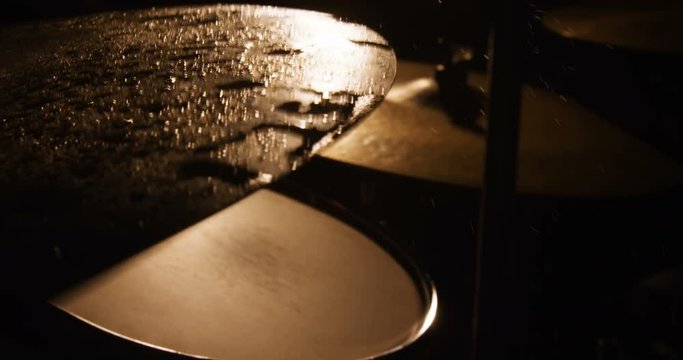Drummer playing drum in studio