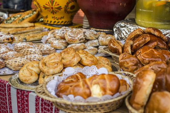 Food background, street showcase with different traditional Ukrainian rolls and pies.