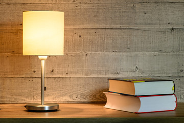 Book illuminated by a lamp / Background.