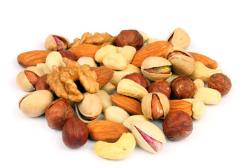 mix almonds, cashew nuts, hazelnut, peanuts, walnuts, pistachio isolated on white background