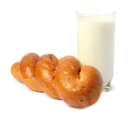 Glass of fresh milk with biscuit isolated on white background