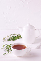 Obraz na płótnie Canvas Thyme herbal tea. Healthy drink. Alternative medicine