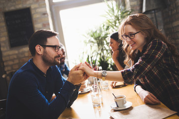 Couple eating out and dating in restaurant