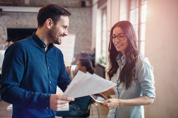 Company coworkers working in office