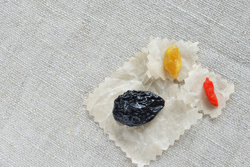 Fototapeta na wymiar prunes, raisin and goji berry