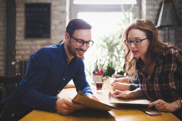 Couple eating out and dating in restaurant